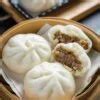  Shouzhuajiang Rousi Baozi:  Een Glutenvrij Smakenwonder Met Tenzere Vulling!